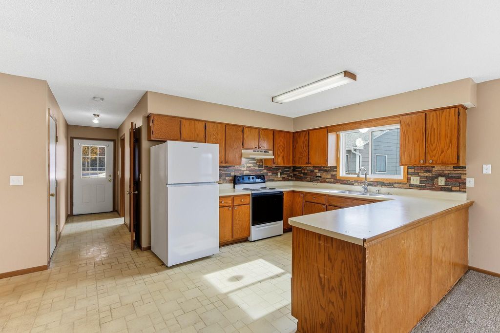 Photo of 705 Auburn Place NW, Elk River, MN 55330 (MLS # 7026928)