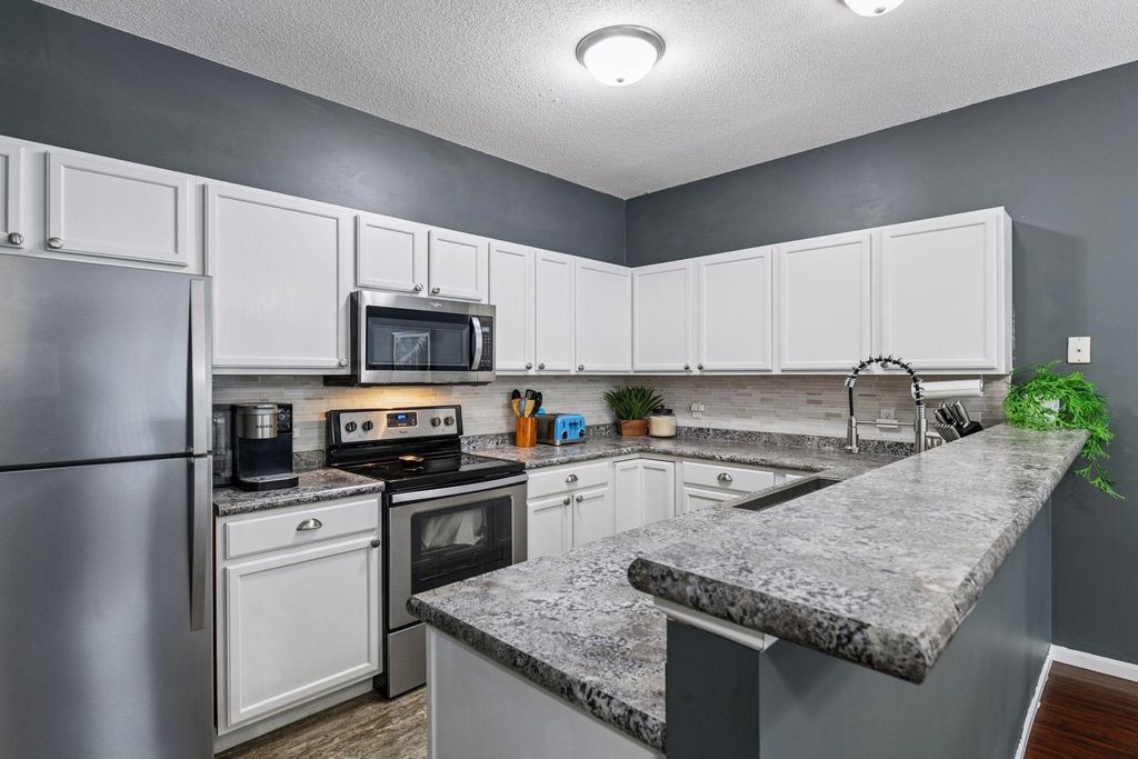 Photo of 642 Willoughby Way W, Minnetonka, MN 55305 (MLS # 7008614)