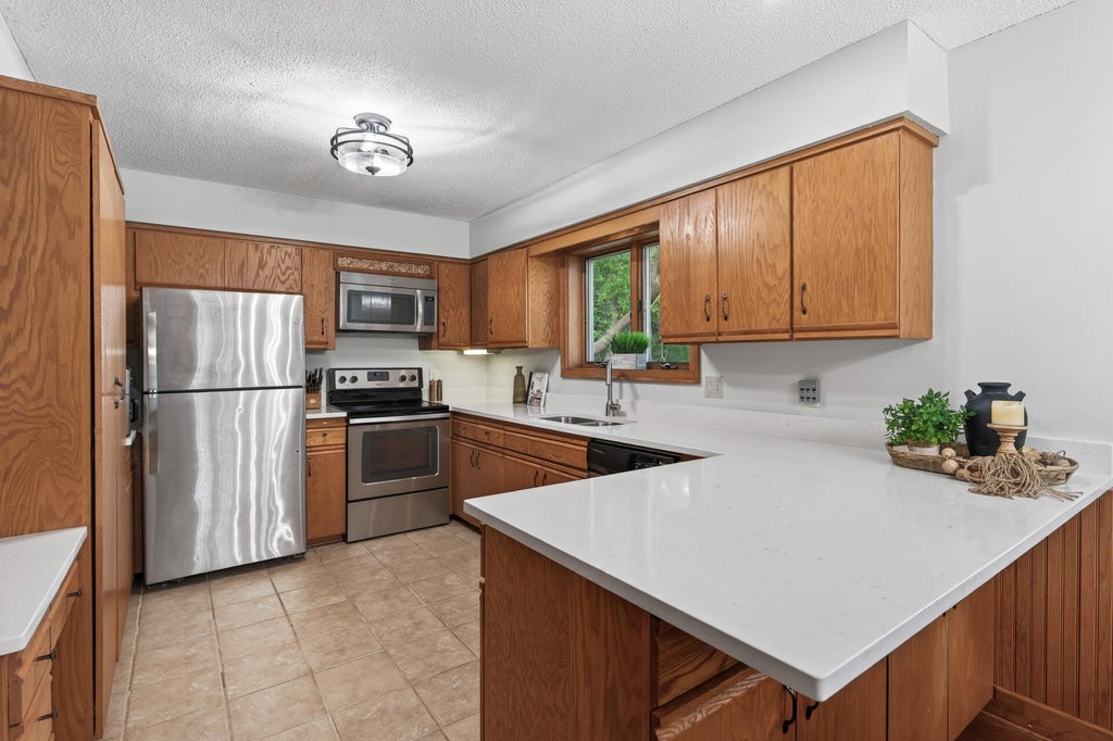 Photo of 23045 Plateau Drive, Lakeville, MN 55044 (MLS # 7146372)