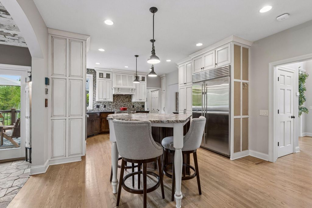 Photo of 8445 Upland Lane N, Maple Grove, MN 55311 (MLS # 7076487)