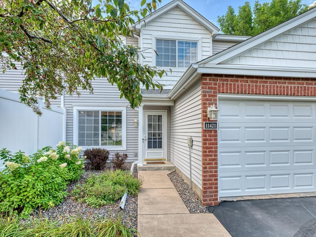 Photo of 11421 Elmwood Avenue N, Champlin, MN 55316 (MLS # 7007472)