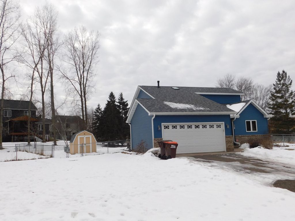 Photo of 6691 13th St Circle N, Oakdale, MN 55128 (MLS # 7009494)