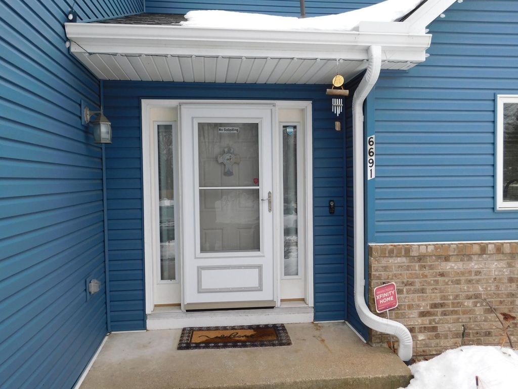 Photo of 6691 13th St Circle N, Oakdale, MN 55128 (MLS # 7009494)