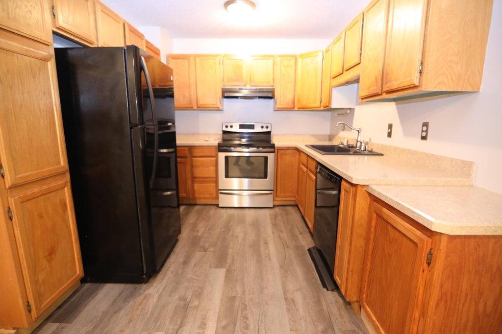 Photo of 942 Main Street NW #104, Elk River, MN 55330 (MLS # 7110707)