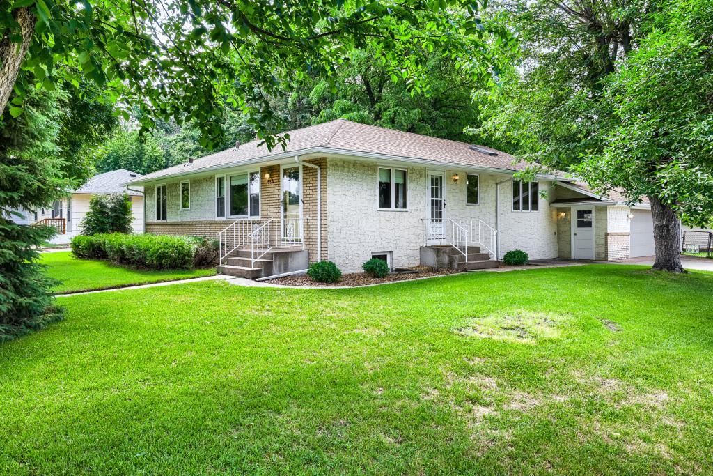 Photo of 558 113th Lane NW, Coon Rapids, MN 55448 (MLS # 7089793)