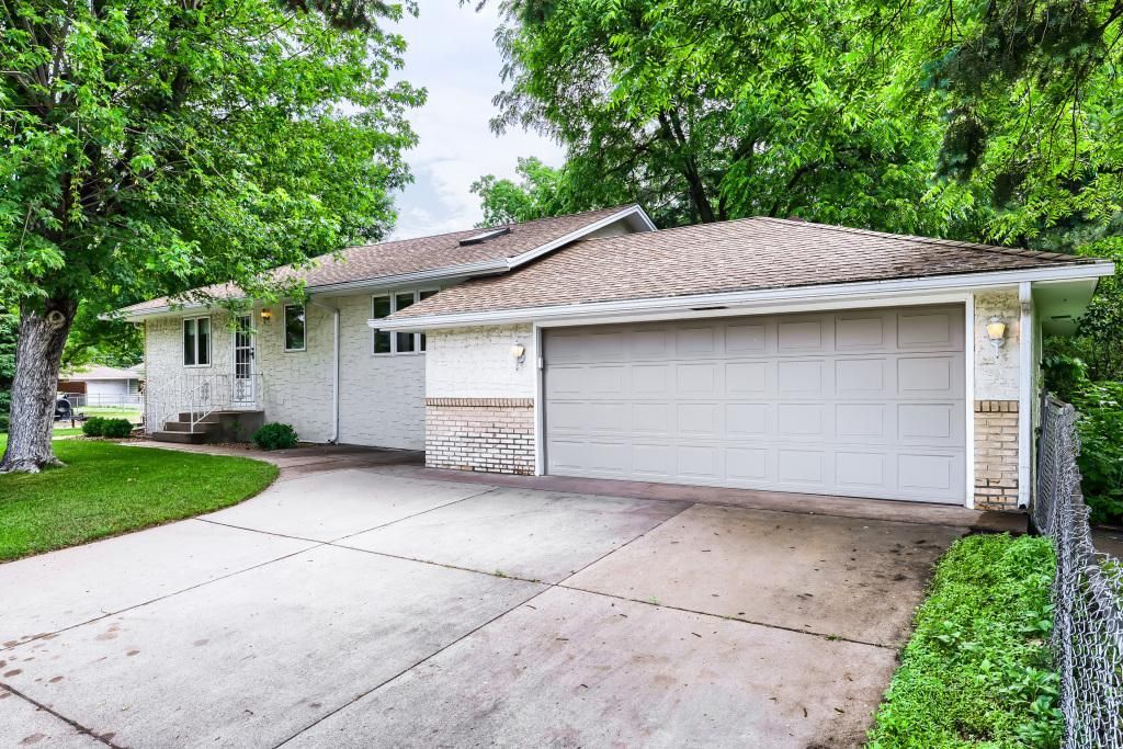 Photo of 558 113th Lane NW, Coon Rapids, MN 55448 (MLS # 7089793)