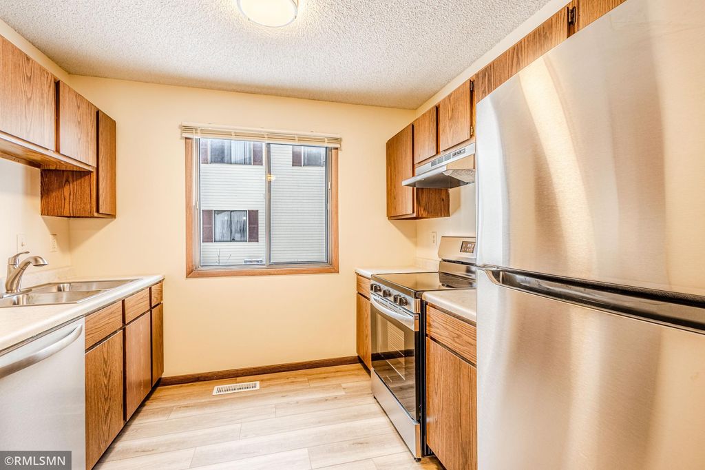 Photo of 6631 84th Court N, Brooklyn Park, MN 55445 (MLS # 7003618)