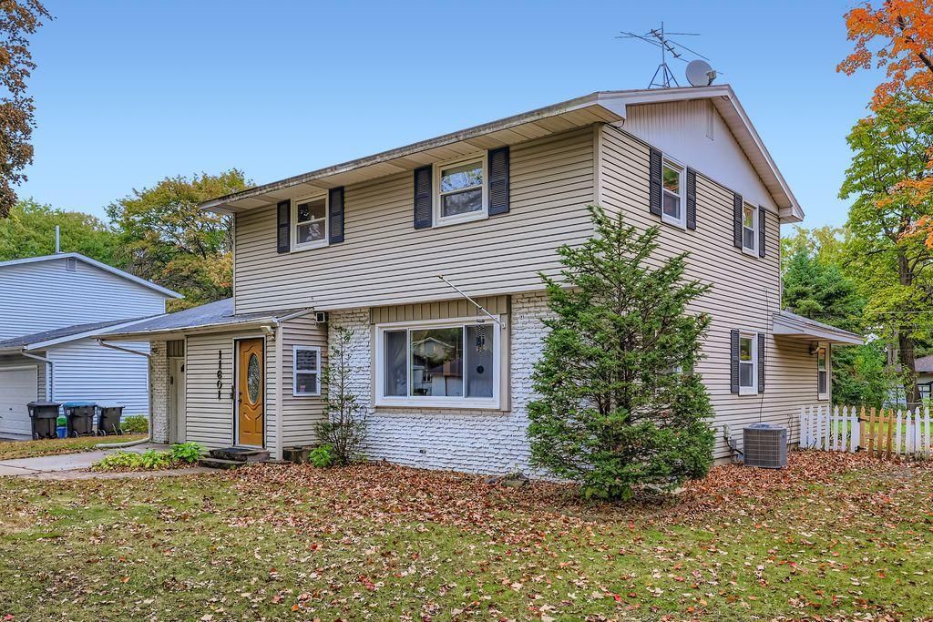 Photo of 11601 9th Avenue NW, Coon Rapids, MN 55433 (MLS # 6805163)