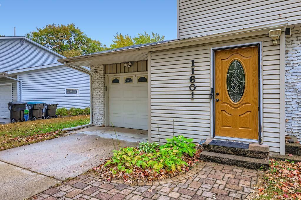 Photo of 11601 9th Avenue NW, Coon Rapids, MN 55433 (MLS # 6805163)