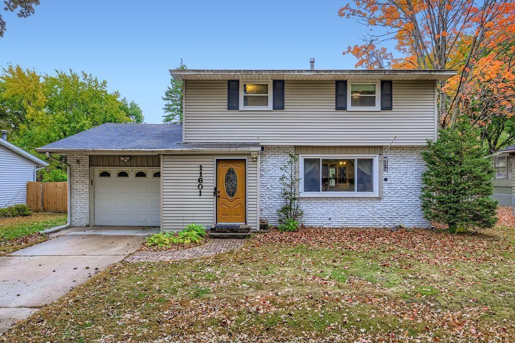 Photo of 11601 9th Avenue NW, Coon Rapids, MN 55433 (MLS # 6805163)