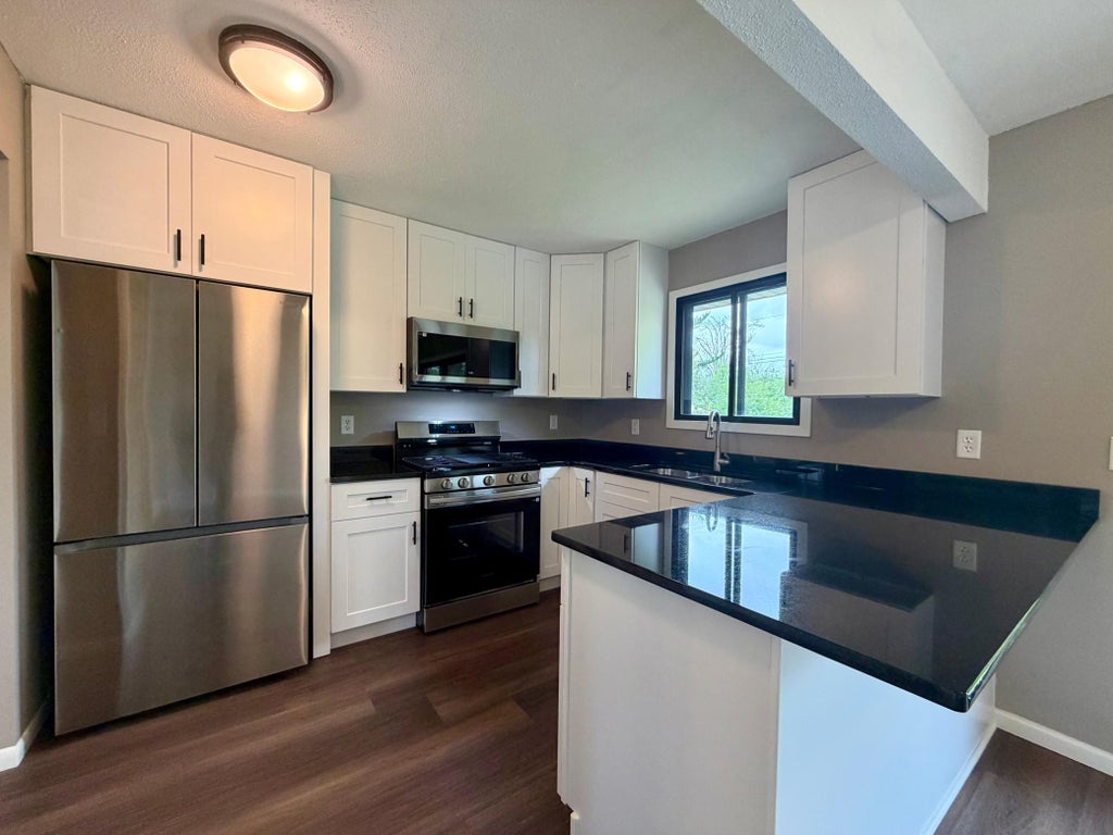 Photo of 1612 69th Avenue N, Brooklyn Center, MN 55430 (MLS # 7140914)
