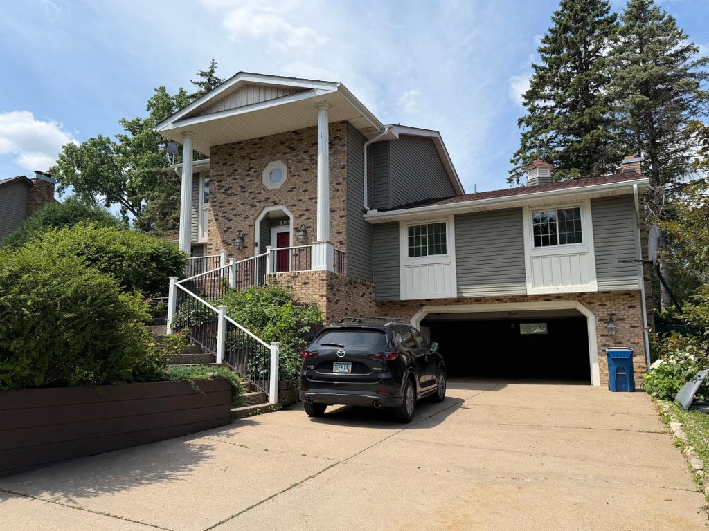 Photo of 798 Torchwood Drive, North Saint Paul, MN 55112 (MLS # 7107767)
