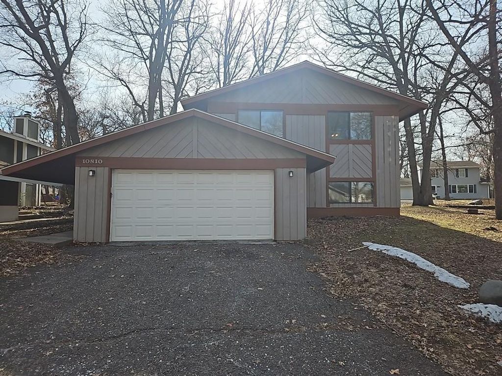 Photo of 10810 Linwood Forest Drive, Champlin, MN 55316 (MLS # 7042331)