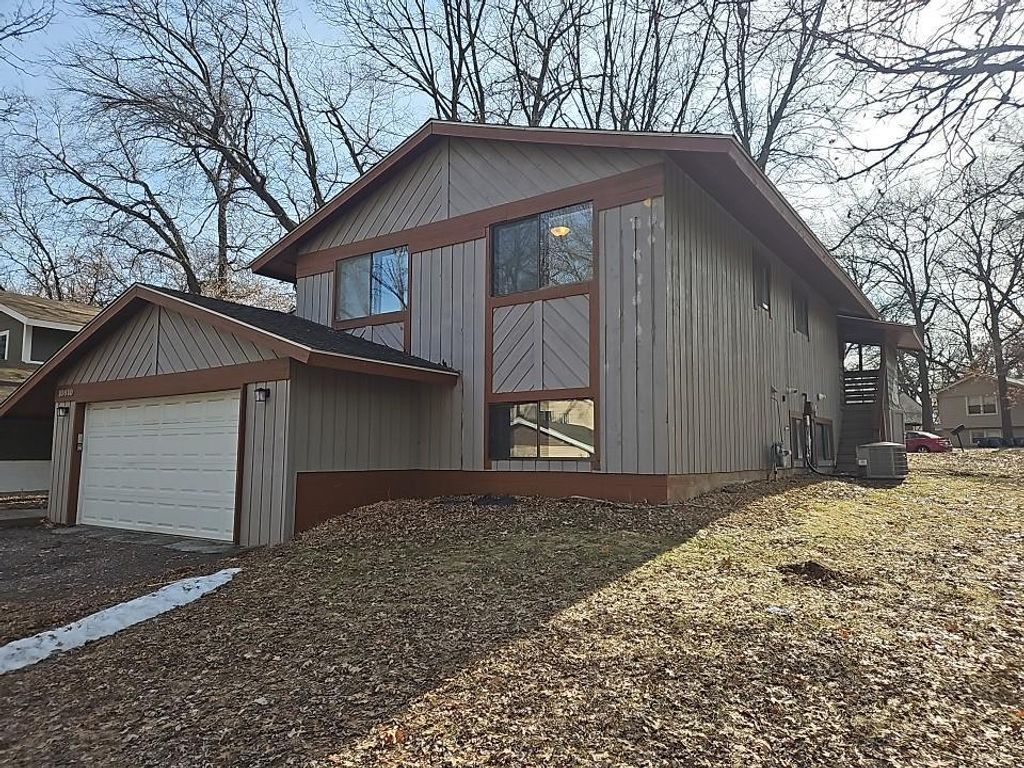 Photo of 10810 Linwood Forest Drive, Champlin, MN 55316 (MLS # 7042331)