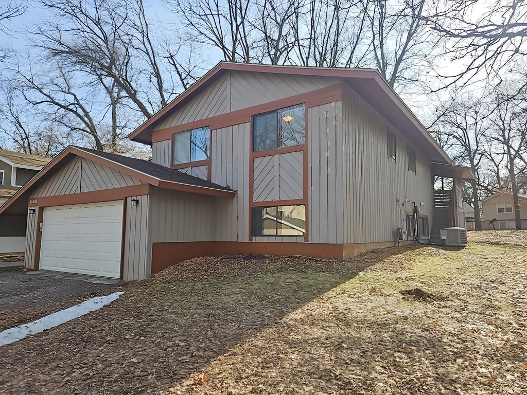 Photo of 10810 Linwood Forest Drive, Champlin, MN 55316 (MLS # 7042331)