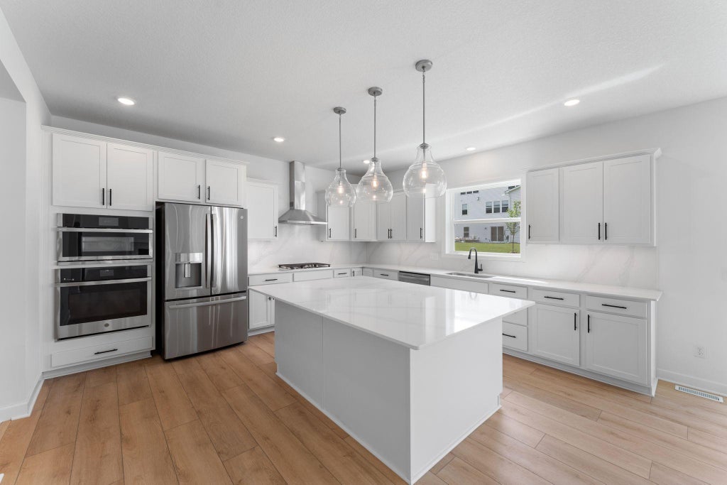 Photo of 1836 Royal Boulevard N, Lake Elmo, MN 55016 (MLS # 7073252)
