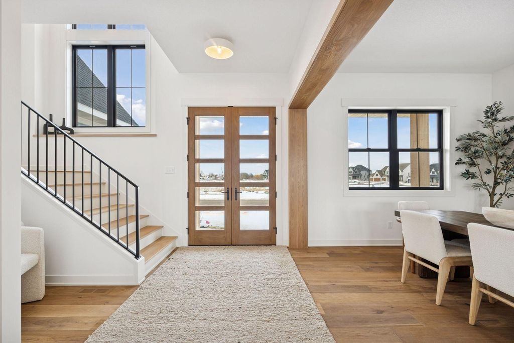 Photo of 10324 Peony Lane N, Maple Grove, MN 55311 (MLS # 7010163)