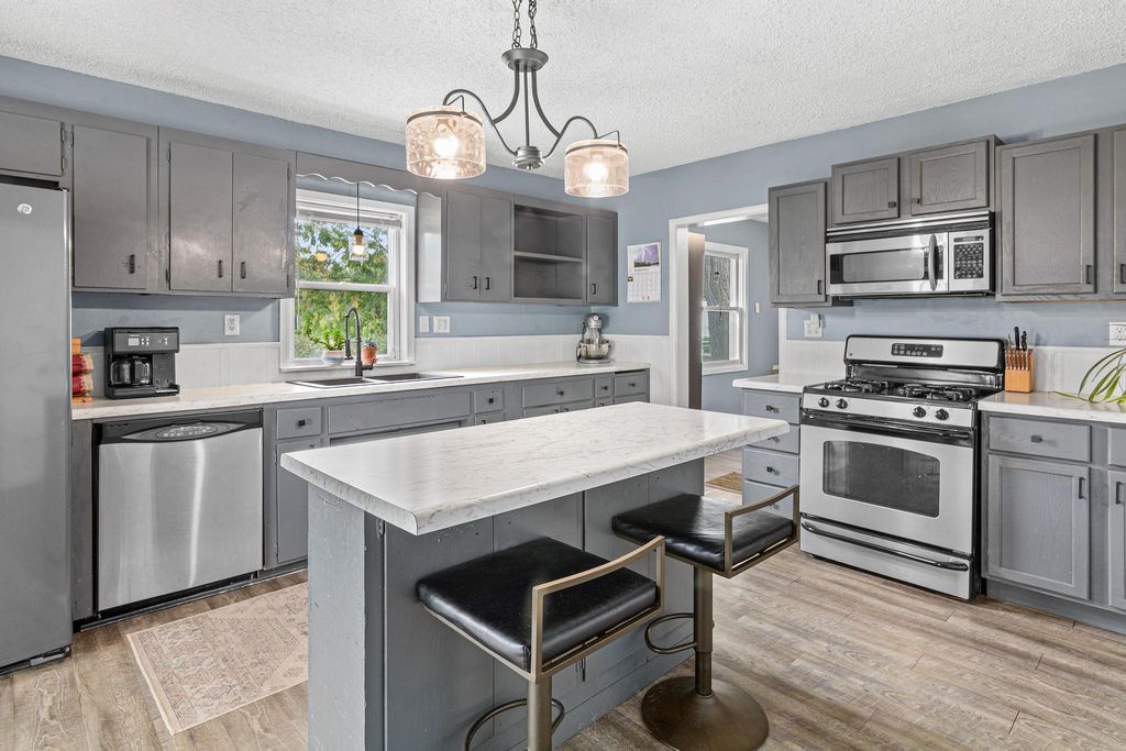 Photo of 653 19th Avenue NE, Minneapolis, MN 55418 (MLS # 7013795)