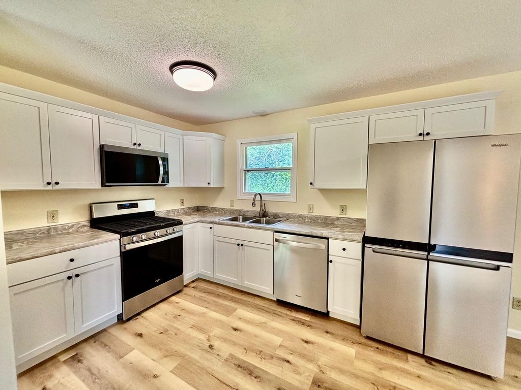 Photo of 12941 Saratoga Lane N, Champlin, MN 55316 (MLS # 7003575)