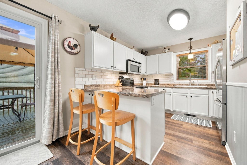 Photo of 5386 Heath Avenue N, Oakdale, MN 55128 (MLS # 7157095)