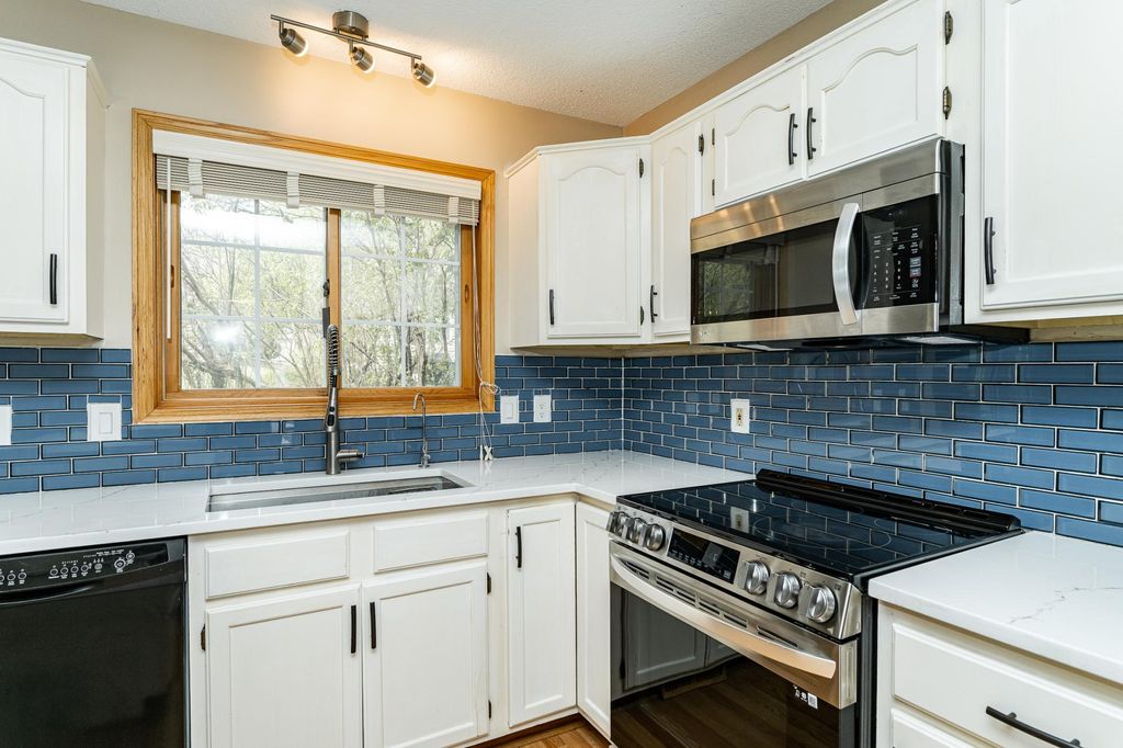 Photo of 2608 Tuxedo Lane NW, Rochester, MN 55901 (MLS # 7038431)