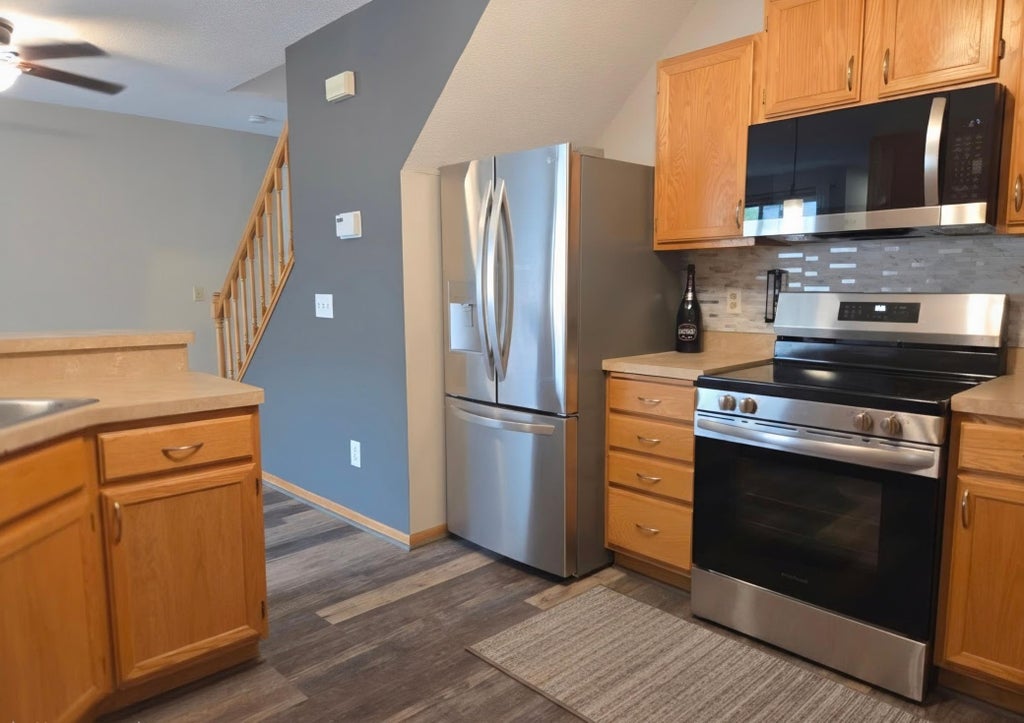 Photo of 13151 Meadowood Way NW #136NW, Coon Rapids, MN 55448 (MLS # 7108767)