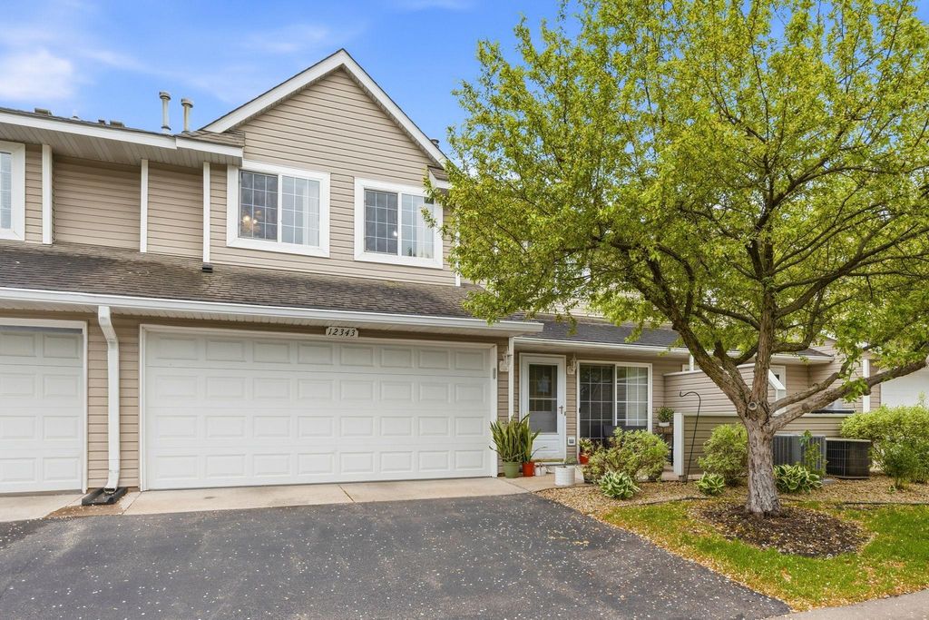 Photo of 12343 Zealand Avenue N, Champlin, MN 55316 (MLS # 7080193)
