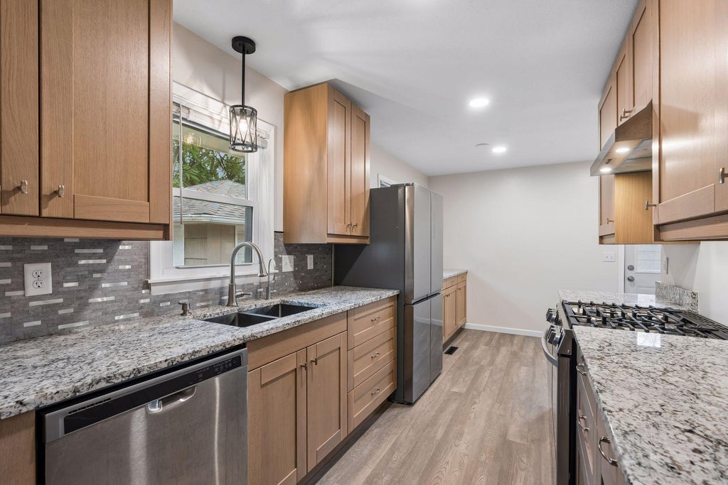 Photo of 300 105th Avenue NE, Blaine, MN 55434 (MLS # 7146434)
