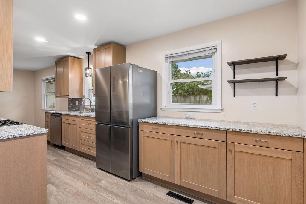 Photo of 300 105th Avenue NE, Blaine, MN 55434 (MLS # 7146434)