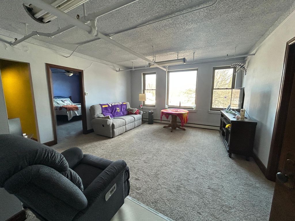 Photo of 1911 7th Avenue E, Hibbing, MN 55746 (MLS # 7028191)