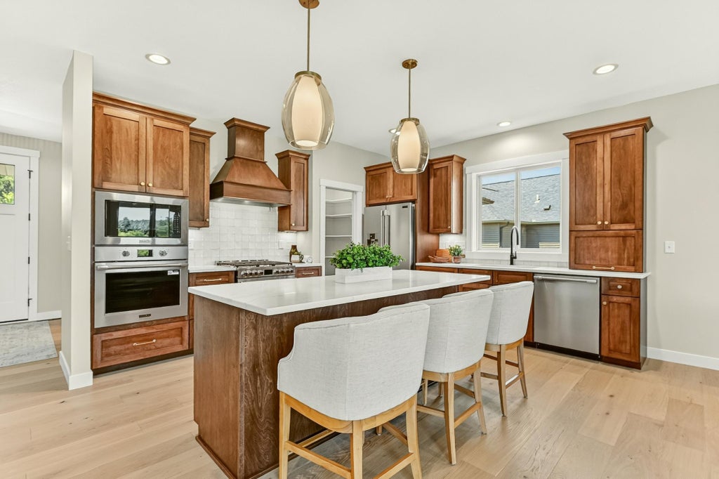 Photo of 4440 Cassidy Ridge Drive NE, Rochester, MN 55906 (MLS # 7111758)