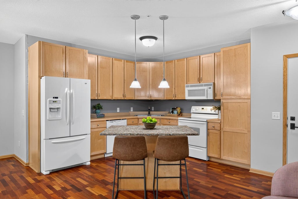 Photo of 9165 Comstock Lane N #209, Maple Grove, MN 55311 (MLS # 7149207)