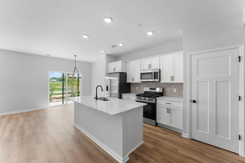 Photo of 679 Tulare Terrace, Newport, MN 55055 (MLS # 7120099)
