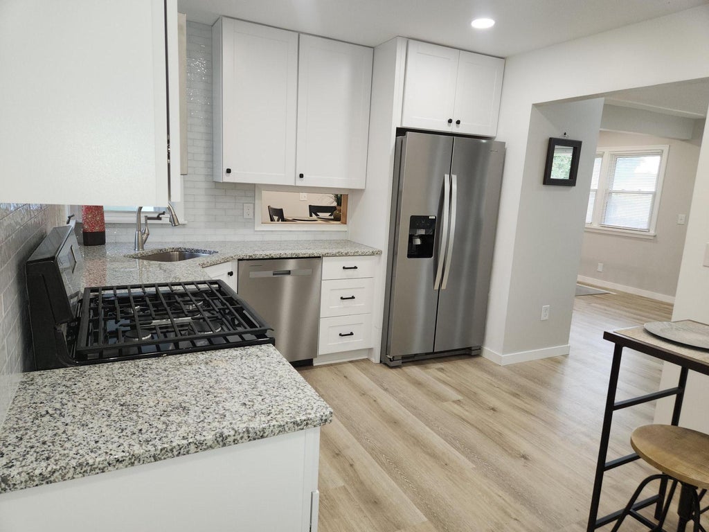 Photo of 500 Bennett Drive NE, Fridley, MN 55432 (MLS # 7143324)