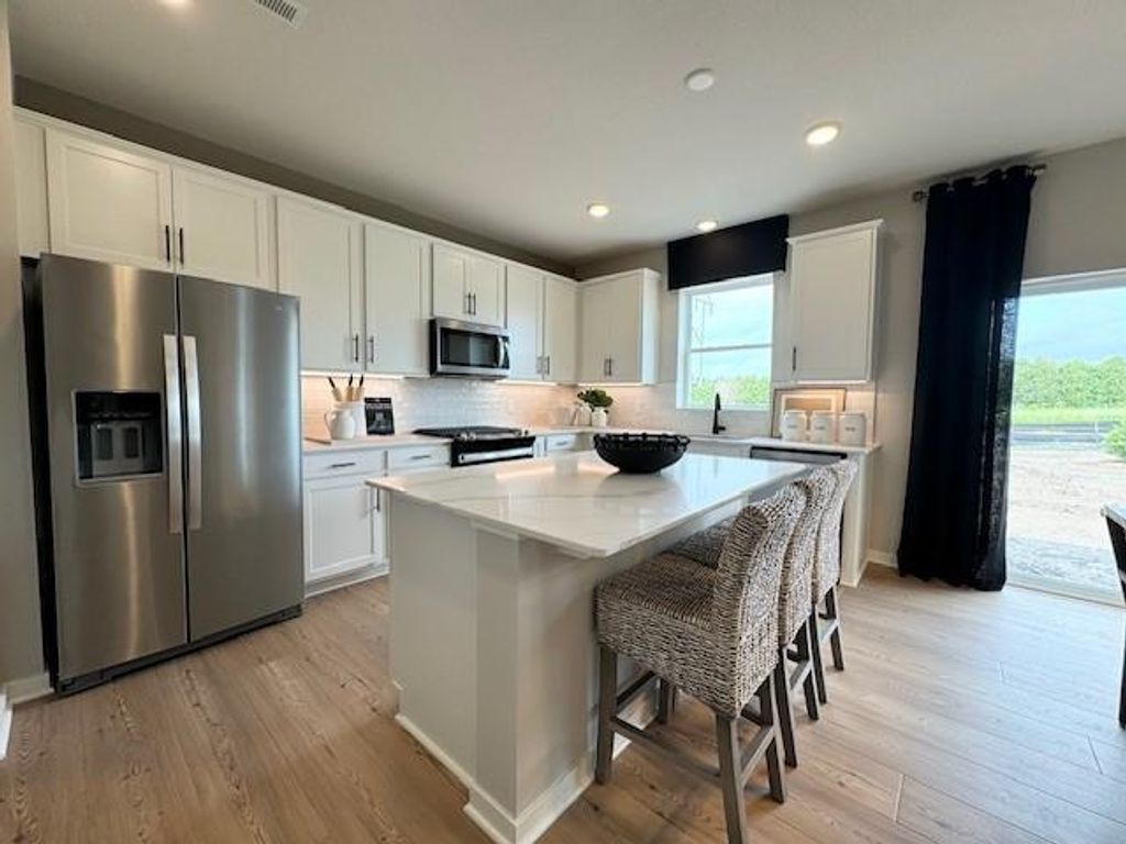 Photo of 4947 Airlake Drive, Woodbury, MN 55129 (MLS # 7001682)