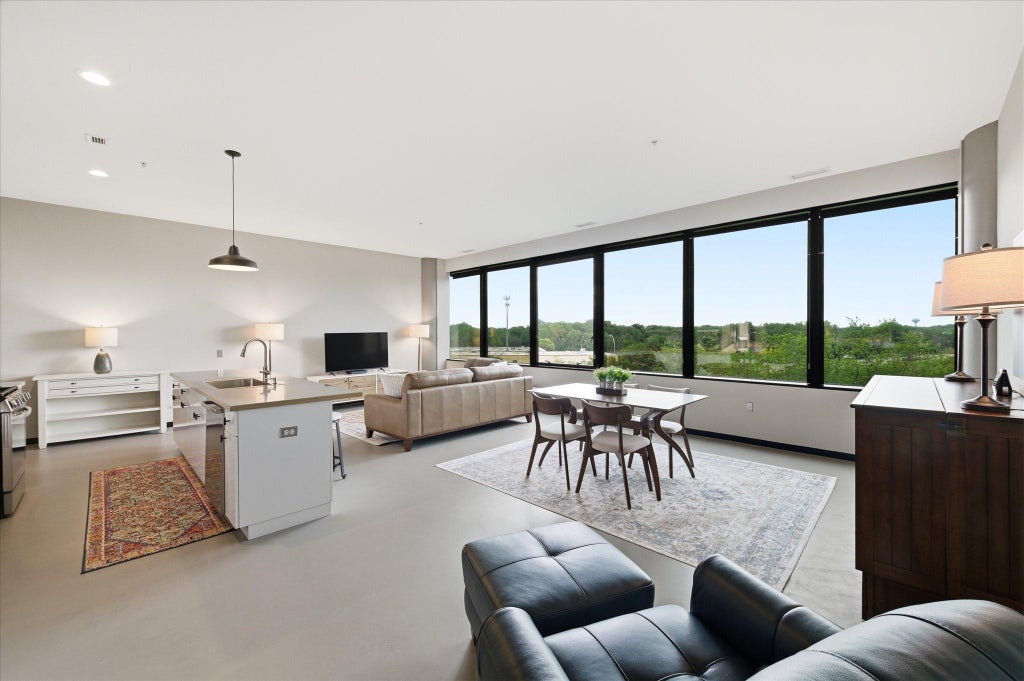 Photo of 5601 Smetana Drive #410, Hopkins, MN 55343 (MLS # 7084228)