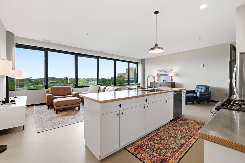 Photo of 5601 Smetana Drive #410, Hopkins, MN 55343 (MLS # 7084228)