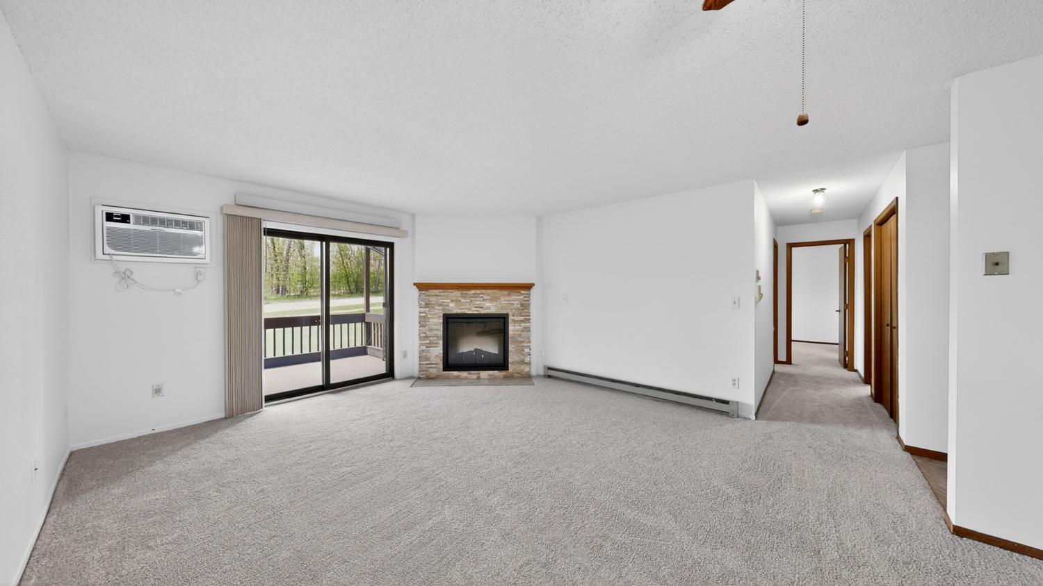 Living room with electric fireplace.