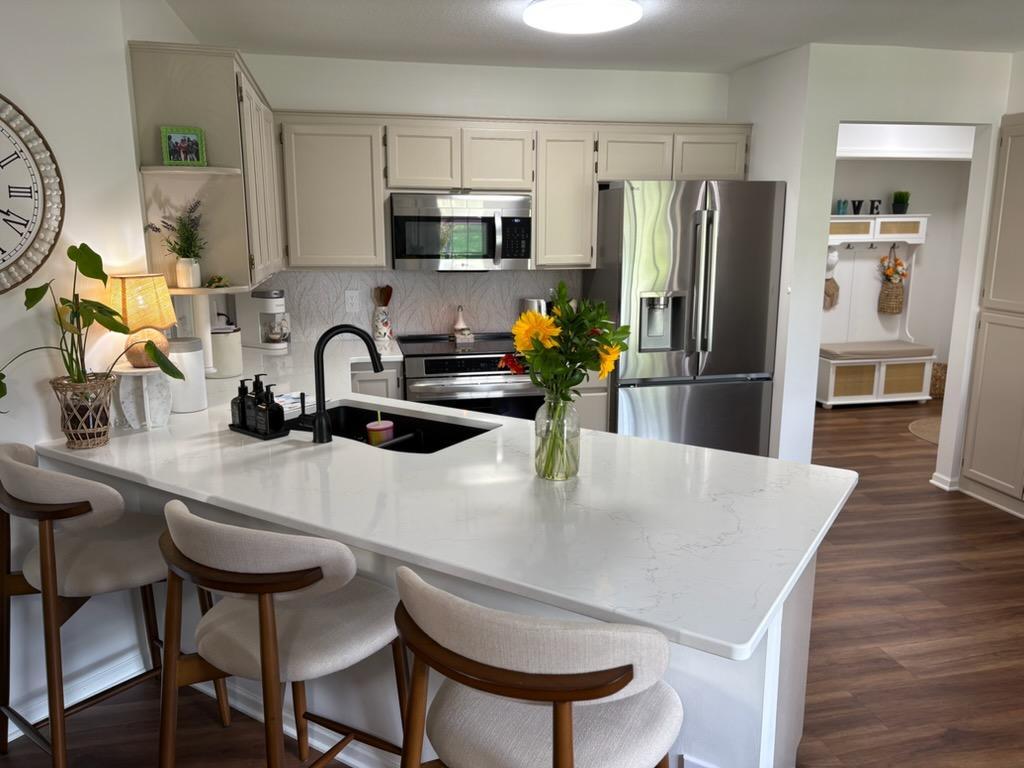 Photo of 14 3rd Street NW, Saint Michael, MN 55376 (MLS # 7105658)