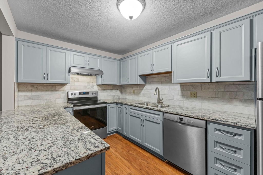 Photo of 1666 Coffman Street #101, Falcon Heights, MN 55108 (MLS # 7003048)