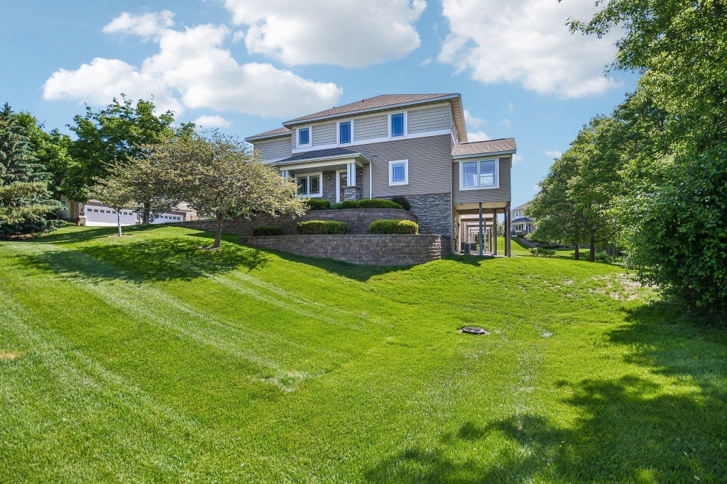 Photo of 630 Sutherland Drive, Woodbury, MN 55129 (MLS # 7052500)