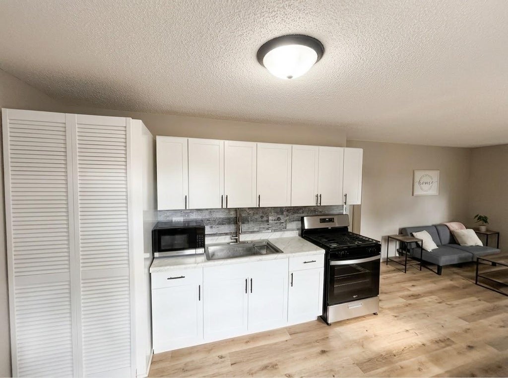 Photo of 10901 4th Street NE, Blaine, MN 55434 (MLS # 7131172)