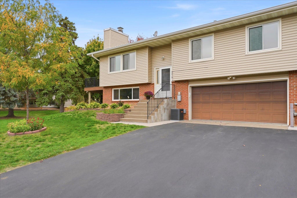 Photo of 9419 Tyler Street NE, Blaine, MN 55434 (MLS # 7136772)