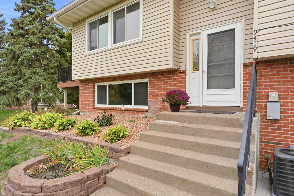 Photo of 9419 Tyler Street NE, Blaine, MN 55434 (MLS # 7136772)
