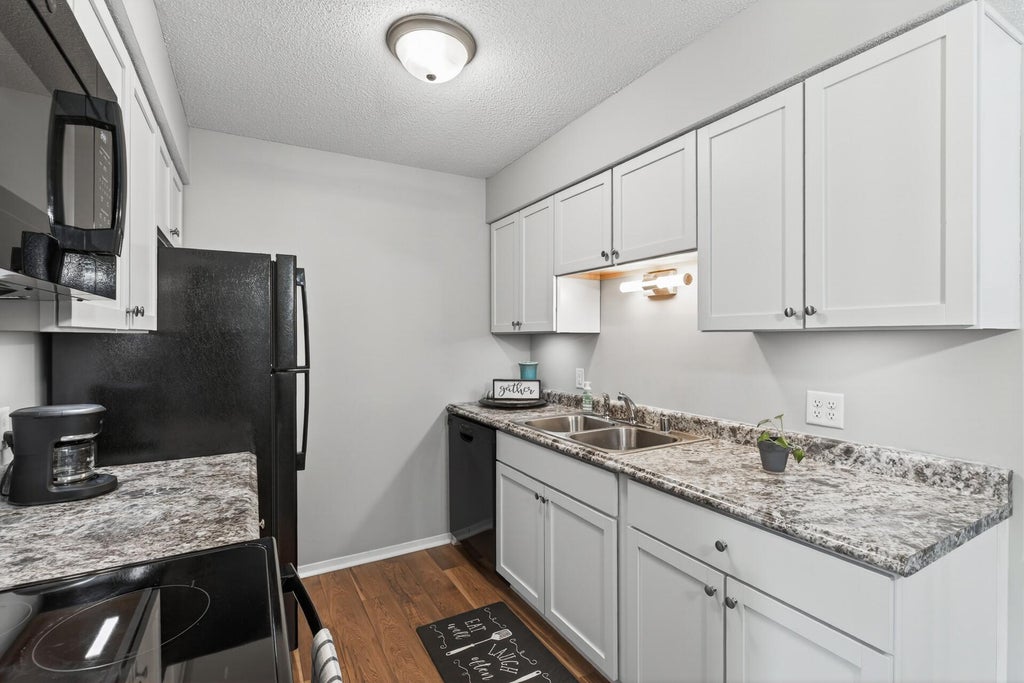 Photo of 7412 W 22nd Street #104, Saint Louis Park, MN 55426 (MLS # 7108243)