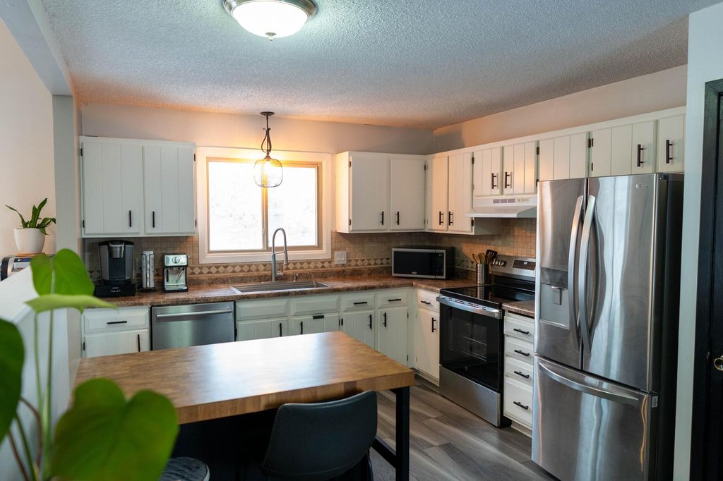 Photo of 8047 Dupont Court N, Brooklyn Park, MN 55444 (MLS # 7007128)