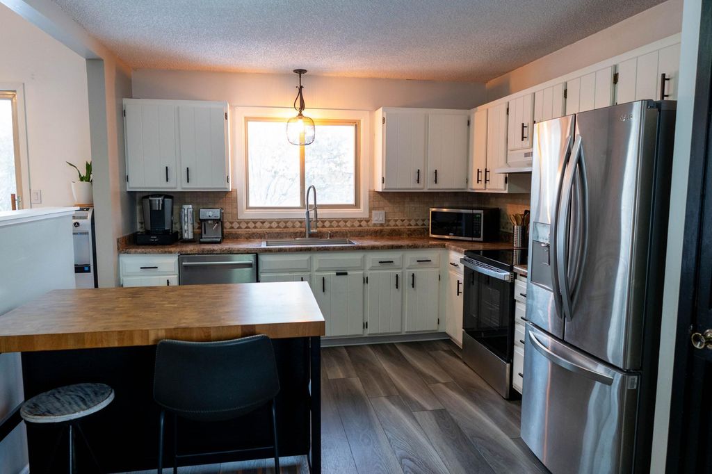 Photo of 8047 Dupont Court N, Brooklyn Park, MN 55444 (MLS # 7007128)