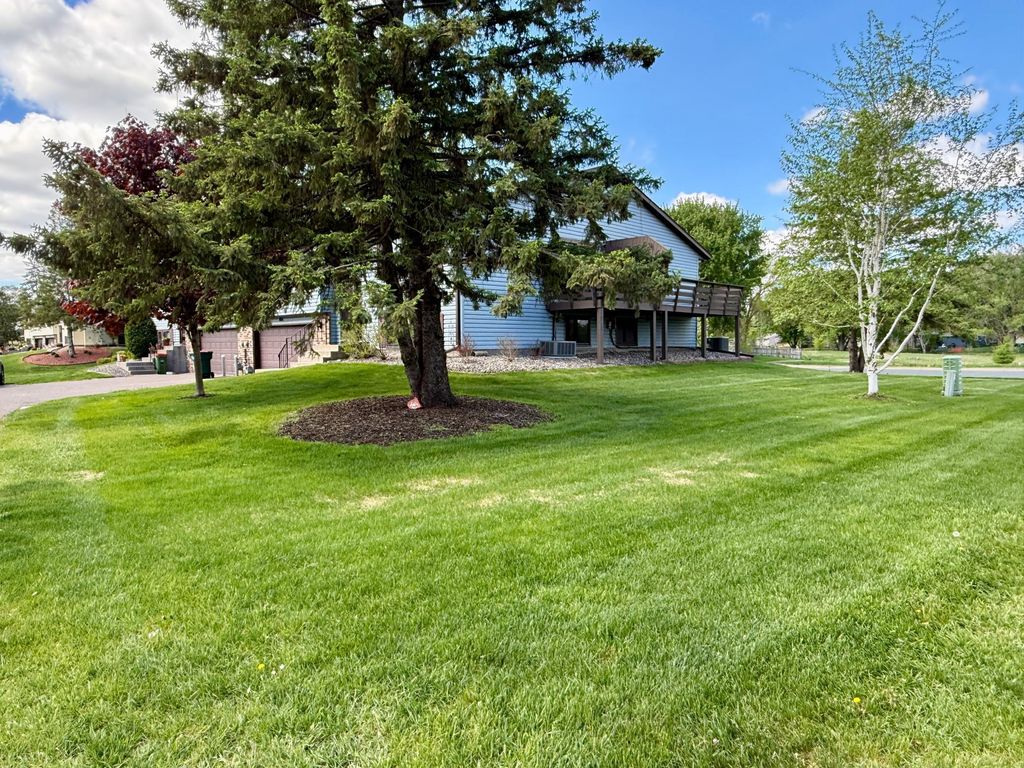 Photo of 1014 122nd Avenue NE, Blaine, MN 55434 (MLS # 7077805)