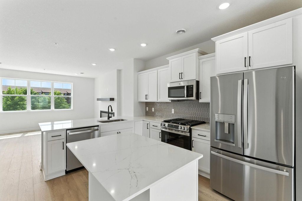 Photo of 7407 East Ramsey Parkway Pkwy NW, Ramsey, MN 55303 (MLS # 6824133)