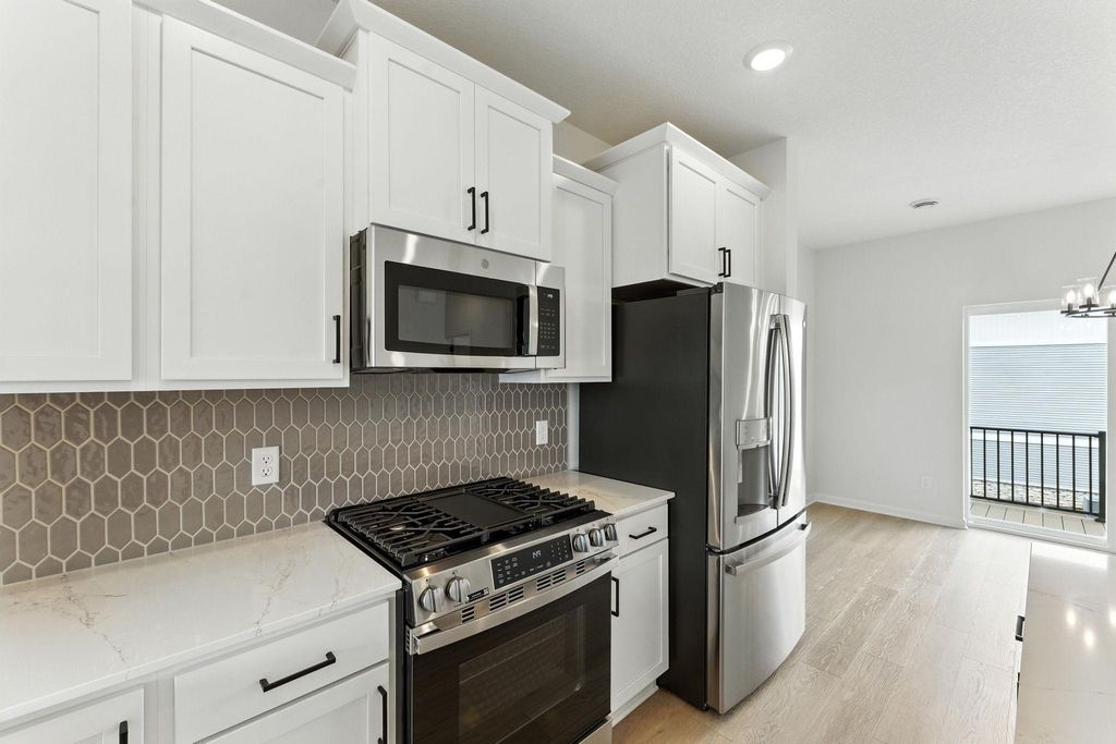 Photo of 7407 East Ramsey Parkway Pkwy NW, Ramsey, MN 55303 (MLS # 6824133)